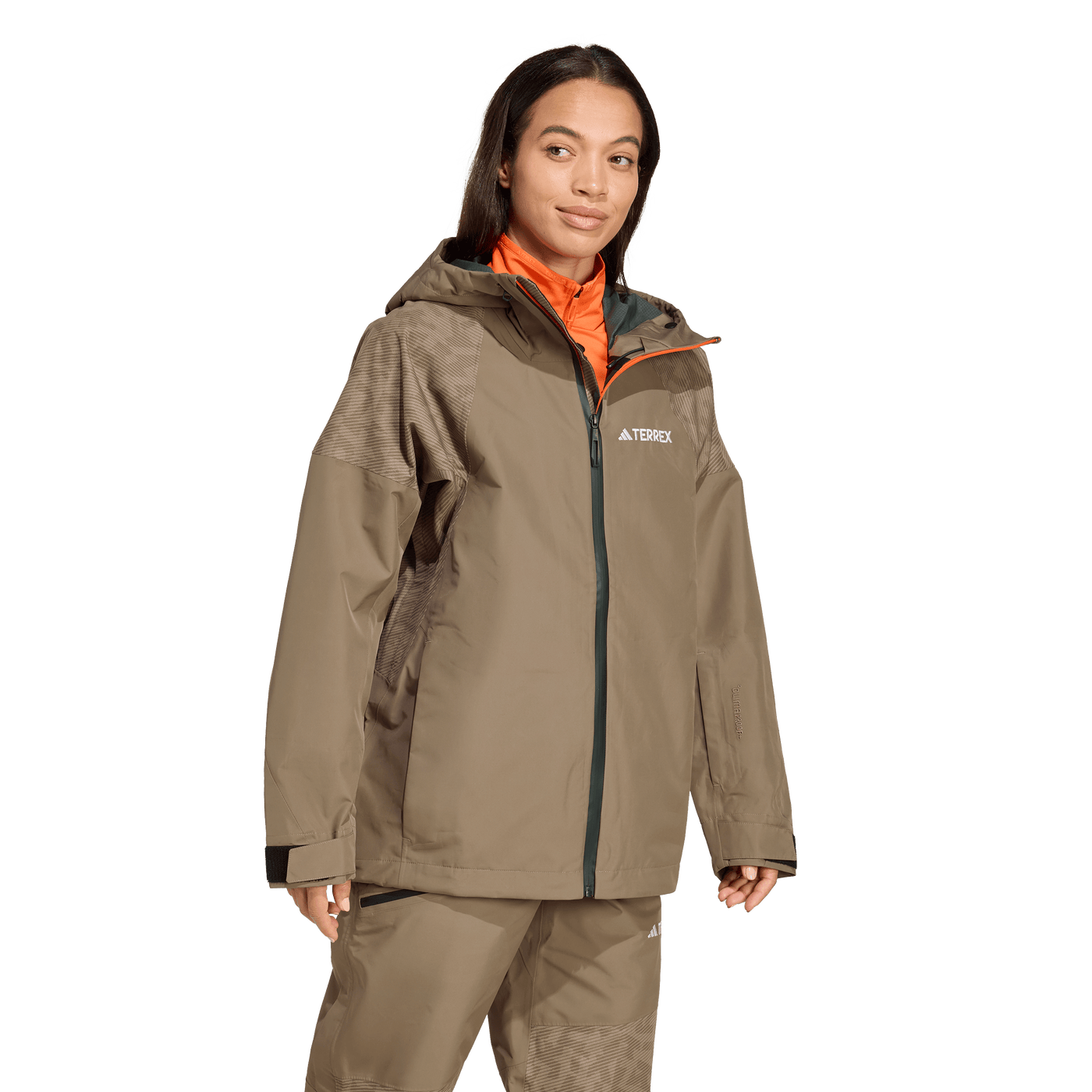 Adida's Women's Terrex Xperior Hybrid PRIMEKNIT CLIMAPROOF+ Jacket - Earth Strata 2026