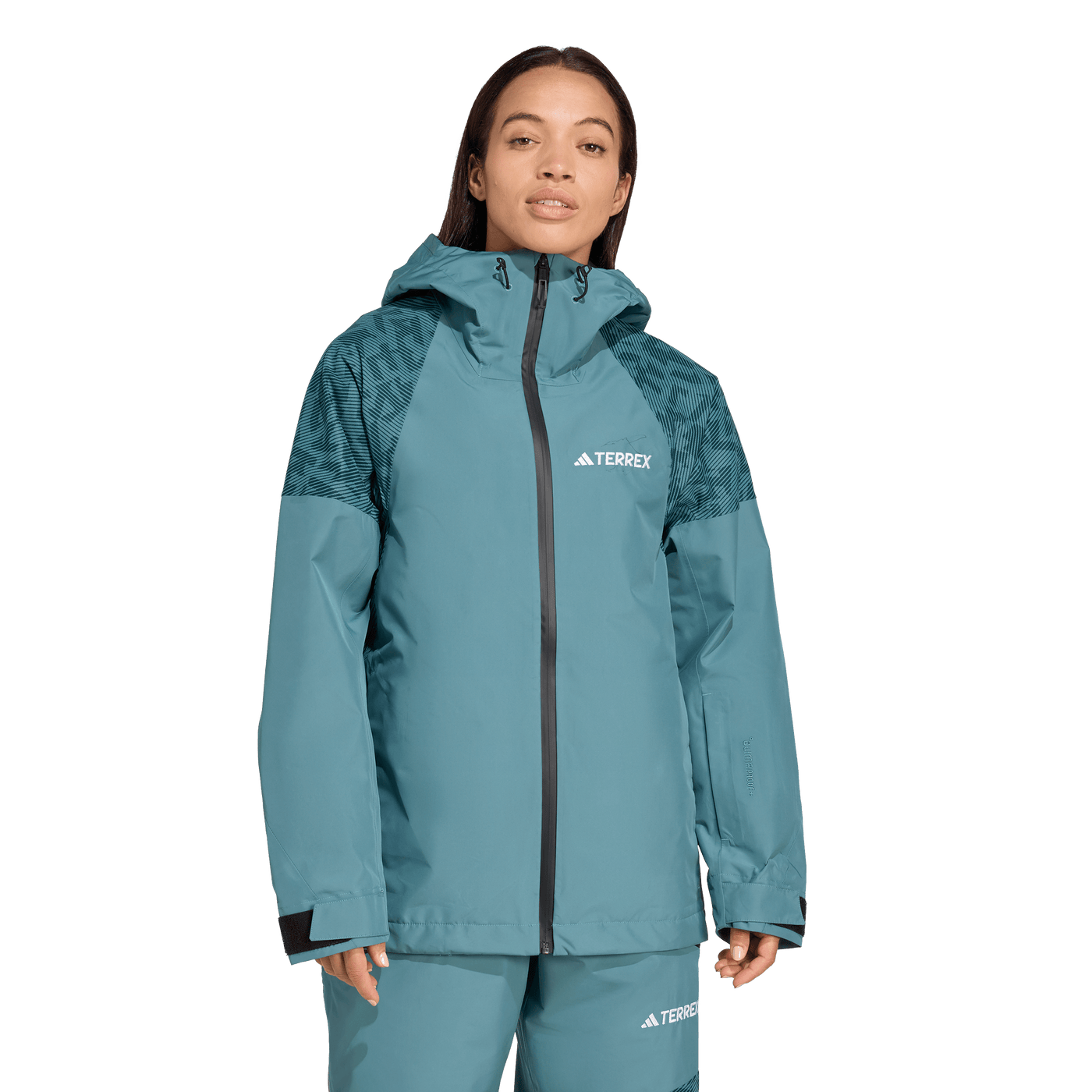 Adida's Women's Terrex Xperior Hybrid PRIMEKNIT CLIMAPROOF+ Jacket - Preloved Teal 2026