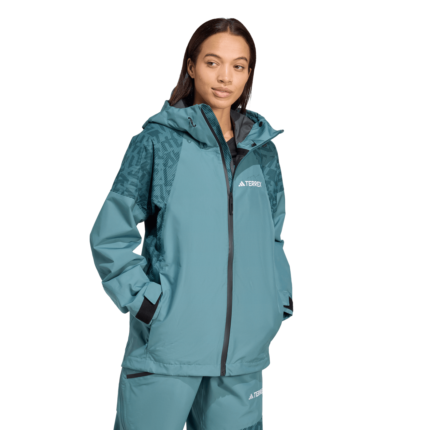 Adida's Women's Terrex Xperior Hybrid PRIMEKNIT CLIMAPROOF+ Jacket - Preloved Teal 2026